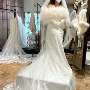 Elegant White Yvonne Le Fleur Wedding Dress with Ostrich Feather Detail
